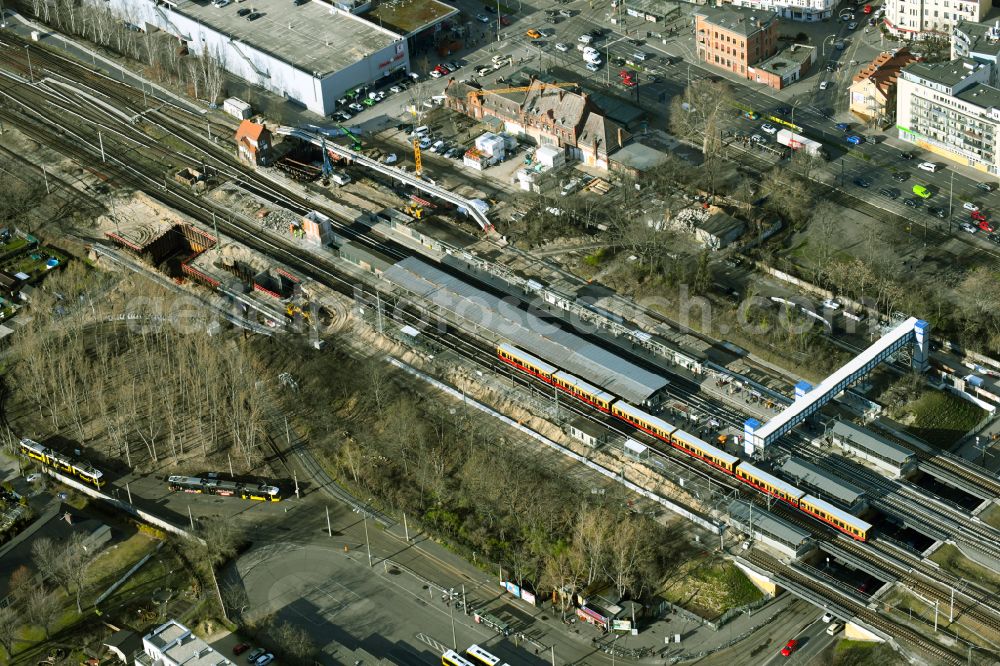 Berlin from the bird's eye view: Construction work for the reconstruction of the station building of S-Bahnhof Schoeneweide in the district Niederschoeneweide in Berlin, Germany