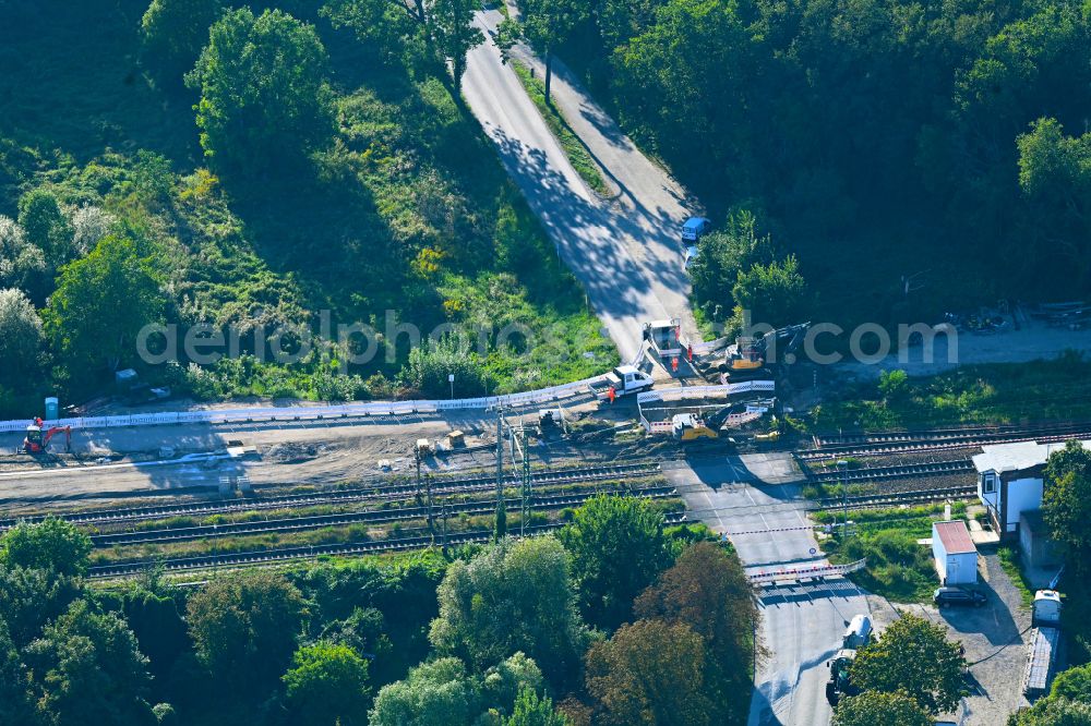 Aerial image Zossen - Construction work for the reconstruction of the station building with tunneling work on place Bahnhofsplatz in Zossen in the state Brandenburg, Germany