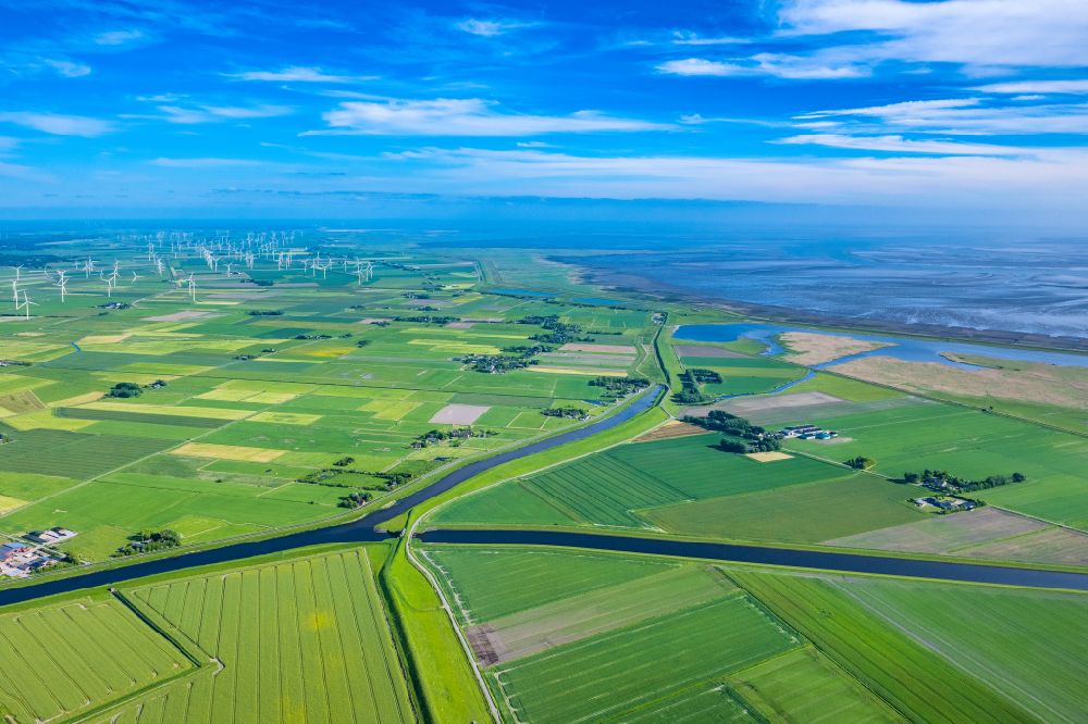 Aerial photograph Ockholm - Farms on the edge of agricultural fields and farmland in Ockholm Nordfriesland in the state Schleswig-Holstein, Germany