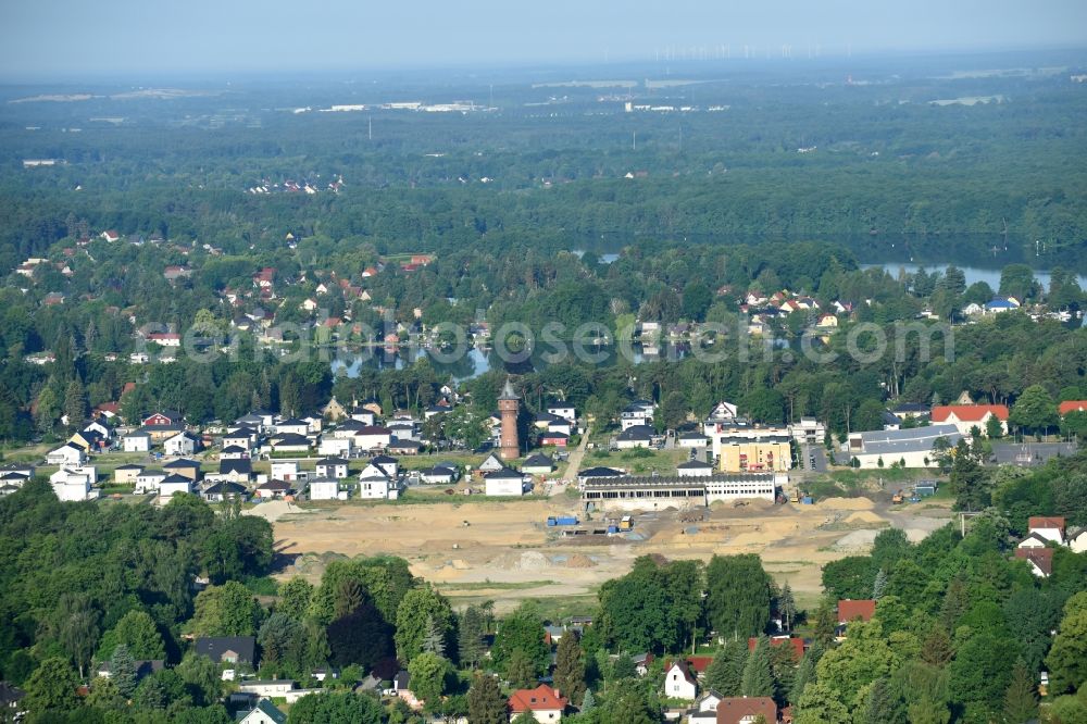 Aerial photograph Königs Wusterhausen - Construction site of the future residential area Koenigsufer on the banks of Zernsee on Wustroweg destrict Zernsdorf in Koenigs Wusterhausen in Brandenburg