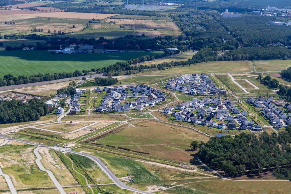 Ludwigsfelde from the bird's eye view: Construction sites for new construction residential area of detached housing estate on Sartrering in district Ludwigsdorf in Ludwigsfelde in the state Brandenburg, Germany