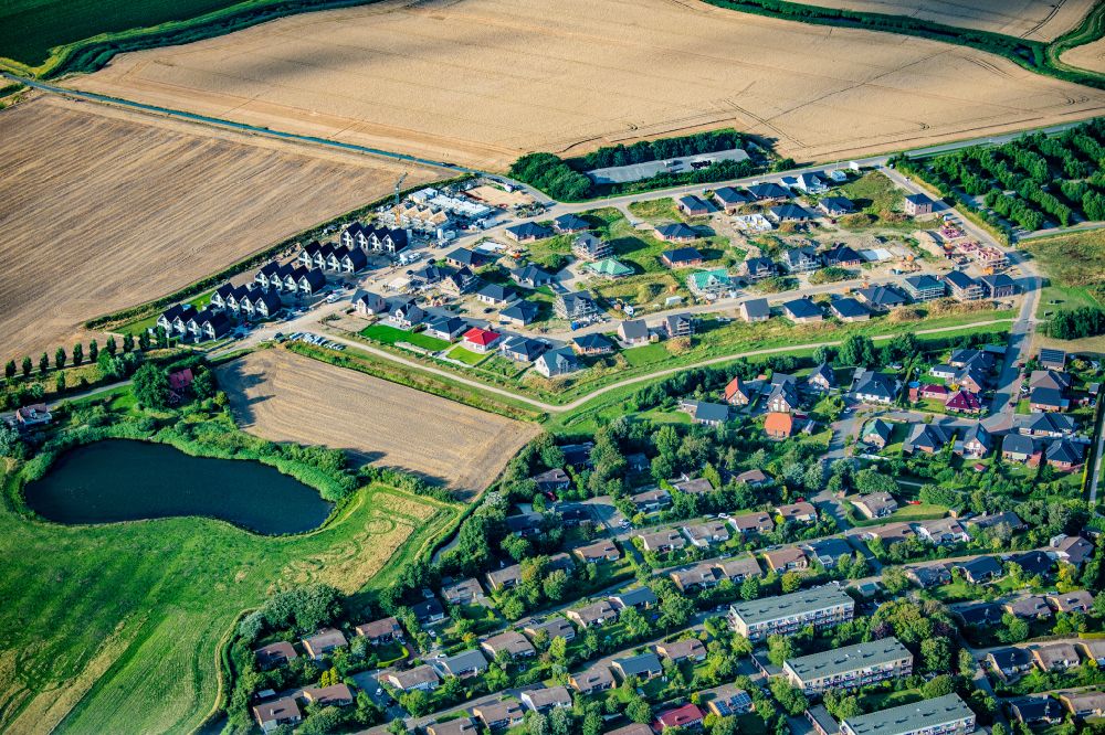 Aerial image Büsum - Construction sites for new construction residential area of detached housing estate in Buesum in the state Schleswig-Holstein, Germany