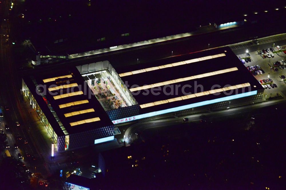 Aerial photograph Berlin - Night image with a view over the grounds of the construction market Bauhaus in Halensee in Berlin