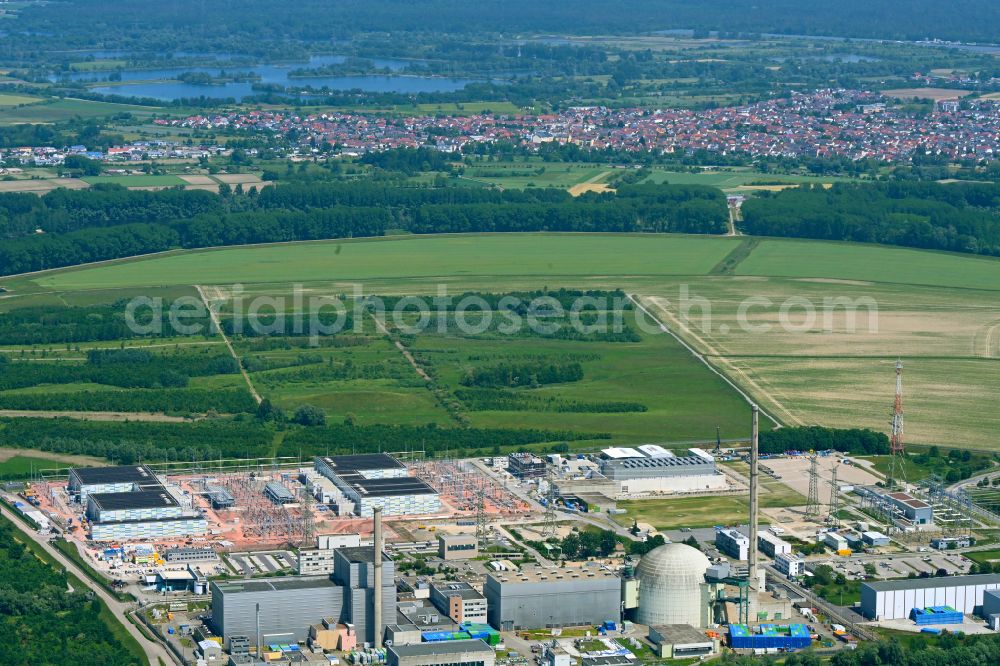 Aerial photograph Philippsburg - Remains of the decommissioned reactor blocks and facilities of the nuclear power plant - KKW Kernkraftwerk EnBW Kernkraft GmbH, Philippsburg nuclear power plant and rubble of the two cooling towers at the shore of the Rhine river in Philippsburg in the state Baden-Wuerttemberg, Germany