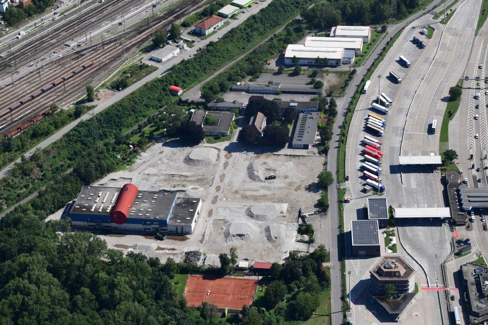 Weil am Rhein from the bird's eye view: Demolition and dismantling of buildings on the former factory grounds of foil manufacturer Lofo at the motorway border control Germany / Switzerland in Weil am Rhein in the state Baden-Wurttemberg, Germany