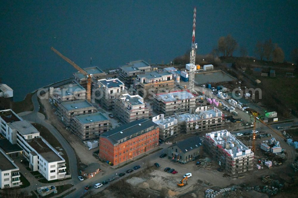 Neuruppin from above - Construction site from the construction of a senior and age-appropriate residential complex Seetor - Residenz II in Seetorviertel in Neuruppin in the state Brandenburg, Germany