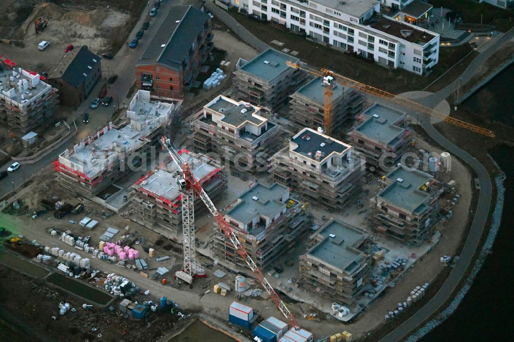 Neuruppin from the bird's eye view: Construction site from the construction of a senior and age-appropriate residential complex Seetor - Residenz II in Seetorviertel in Neuruppin in the state Brandenburg, Germany