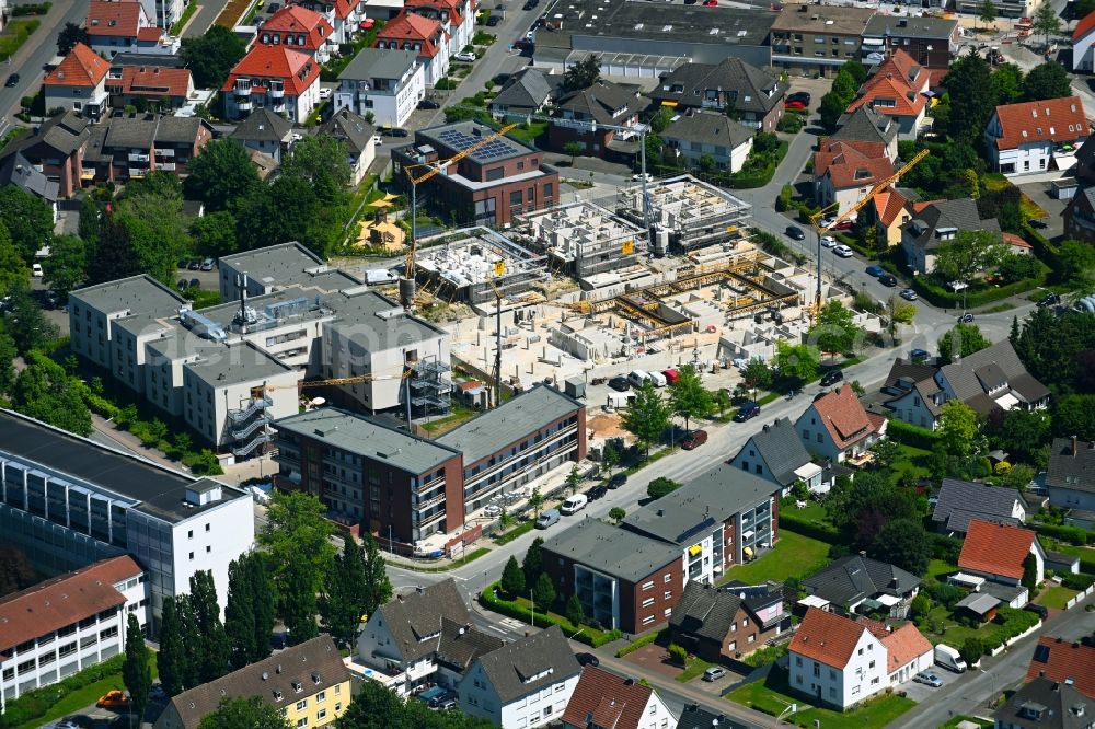 Rheda from the bird's eye view: Construction site from the construction of a senior and age-appropriate residential complex Seniorenzentrum St. Elisabeth in Rheda in the state North Rhine-Westphalia, Germany