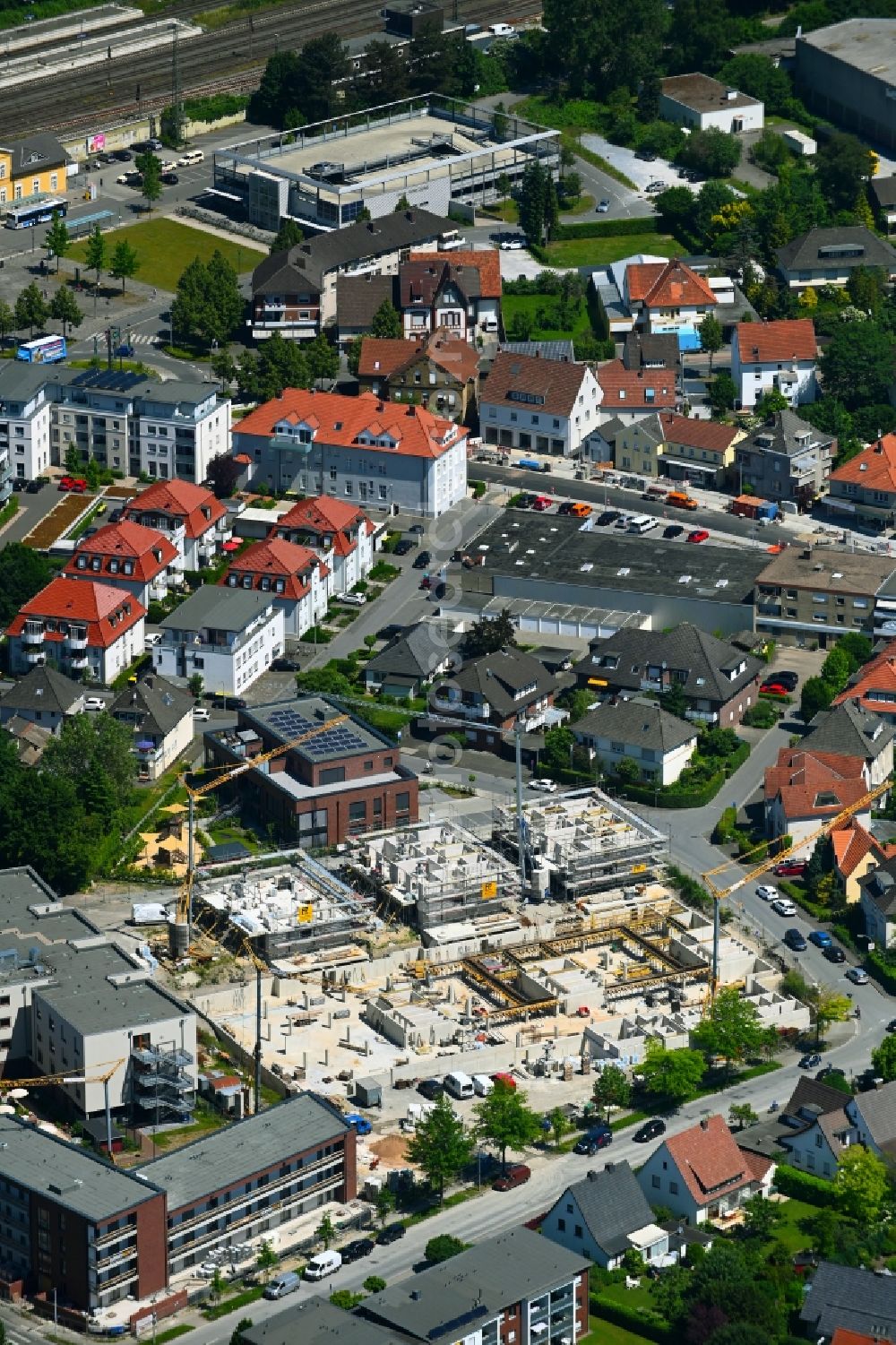 Aerial photograph Rheda - Construction site from the construction of a senior and age-appropriate residential complex Seniorenzentrum St. Elisabeth in Rheda in the state North Rhine-Westphalia, Germany