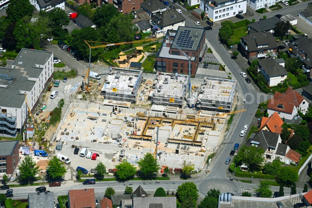 Rheda from the bird's eye view: Construction site from the construction of a senior and age-appropriate residential complex Seniorenzentrum St. Elisabeth in Rheda in the state North Rhine-Westphalia, Germany