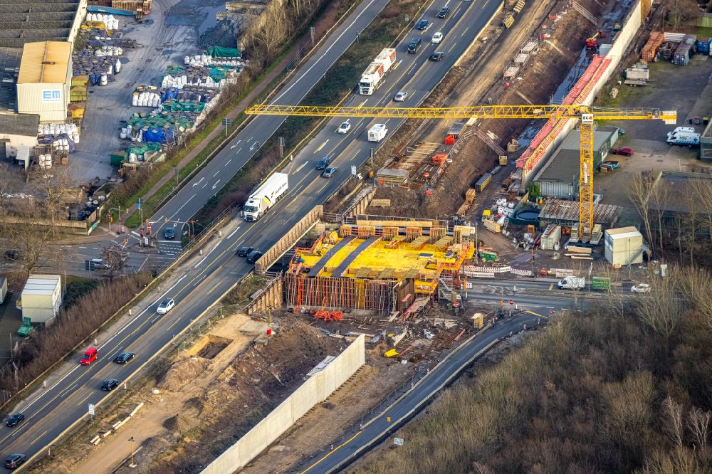 Aerial image Duisburg - Construction site for the new building of Routing and traffic lanes over the highway bridge in the motorway A 40, Ausfahrt Duisburg Hafen on street Am Schluetershof in the district Neuenkamp in Duisburg at Ruhrgebiet in the state North Rhine-Westphalia, Germany