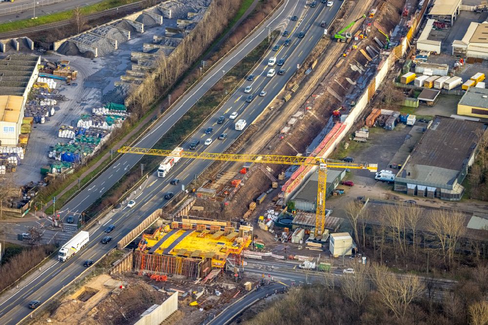 Aerial photograph Duisburg - Construction site for the new building of Routing and traffic lanes over the highway bridge in the motorway A 40, Ausfahrt Duisburg Hafen on street Am Schluetershof in the district Neuenkamp in Duisburg at Ruhrgebiet in the state North Rhine-Westphalia, Germany
