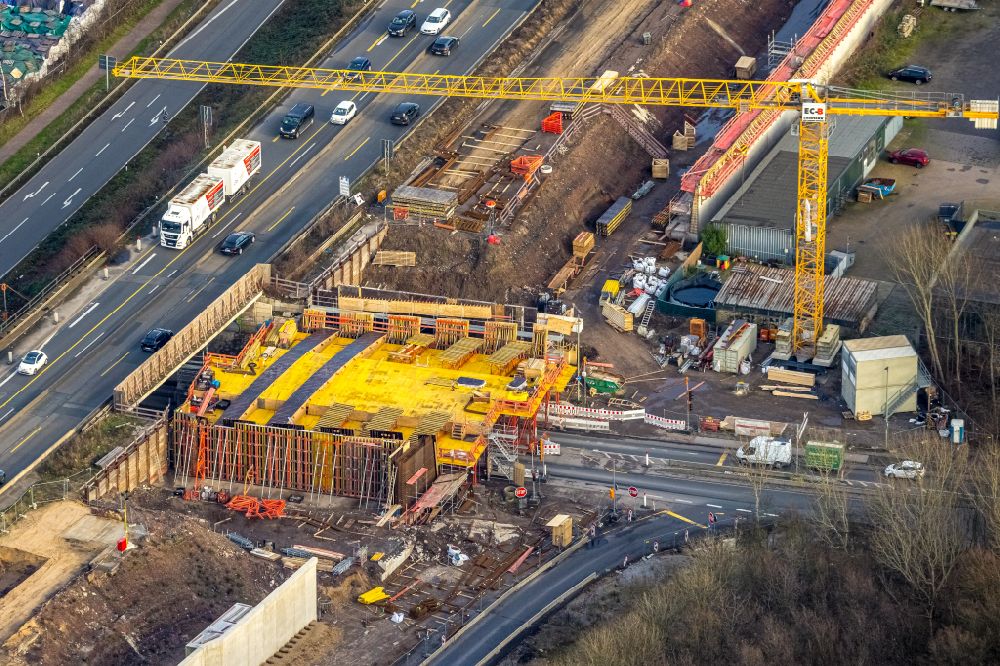 Duisburg from above - Construction site for the new building of Routing and traffic lanes over the highway bridge in the motorway A 40, Ausfahrt Duisburg Hafen on street Am Schluetershof in the district Neuenkamp in Duisburg at Ruhrgebiet in the state North Rhine-Westphalia, Germany