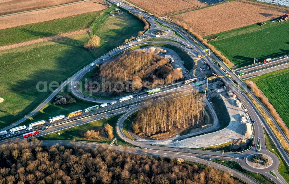 Ringsheim from above - Construction site for the new building of Routing and traffic lanes over the highway bridge in the motorway A A5 Ausfahrt Rust Ringsheim in Ringsheim in the state Baden-Wurttemberg, Germany