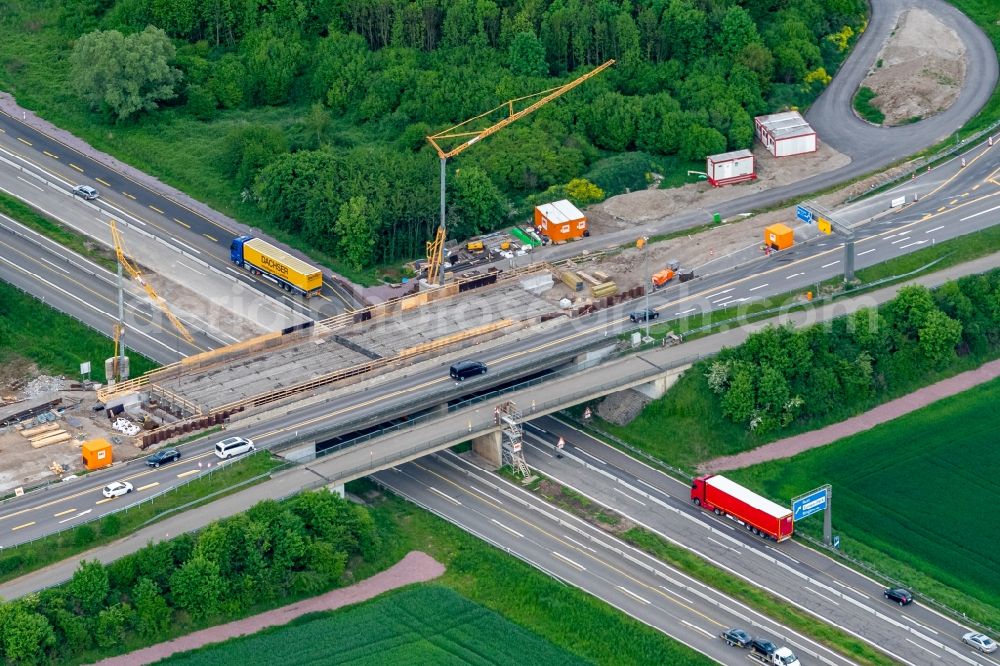 Aerial image Ringsheim - Construction site for the new building of Routing and traffic lanes over the highway bridge in the motorway A A5 Ausfahrt Rust Ringsheim in Ringsheim in the state Baden-Wurttemberg, Germany