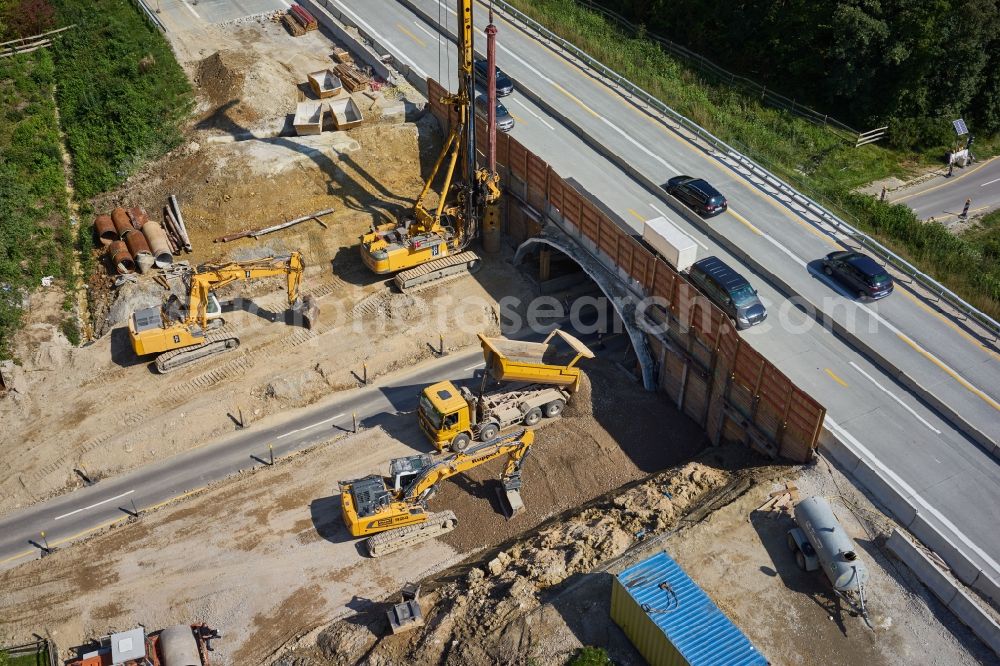 Gollhofen from above - Construction site for the new building of Routing and traffic lanes over the highway bridge in the motorway A in Gollhofen in the state Bavaria, Germany