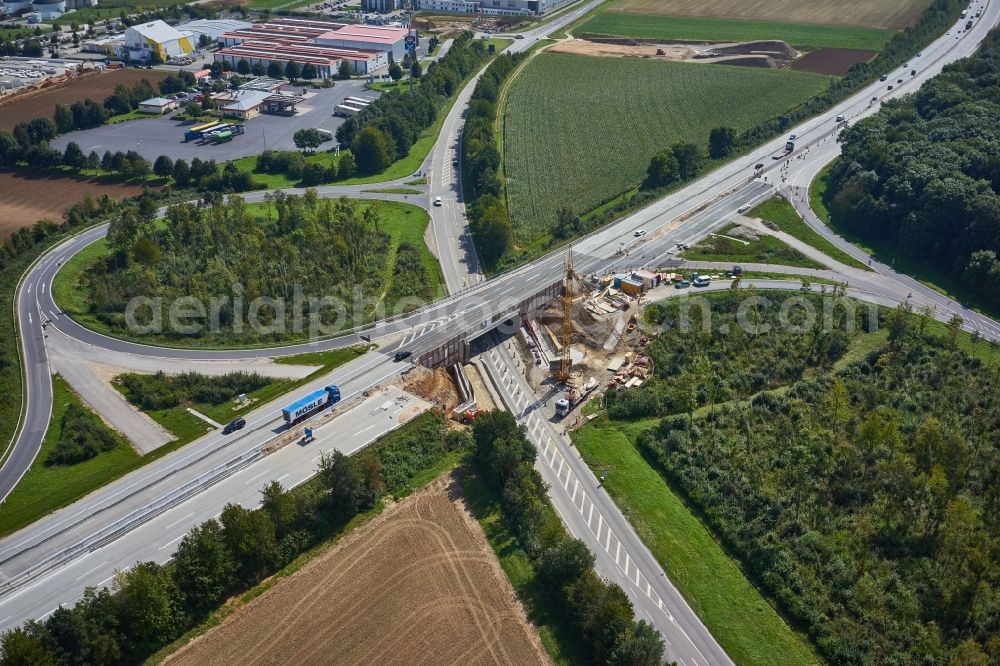 Aerial image Ippesheim - Construction site for the new building of Routing and traffic lanes over the highway bridge in the motorway A in Ippesheim in the state Bavaria, Germany