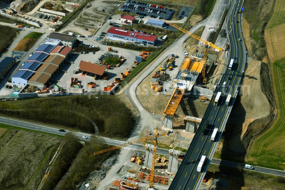 Aerial photograph Kürnach - Construction site for the new building of Routing and traffic lanes over the highway bridge Kuernachtalbruecke in the motorway A 7 in Kuernach in the state Bavaria, Germany