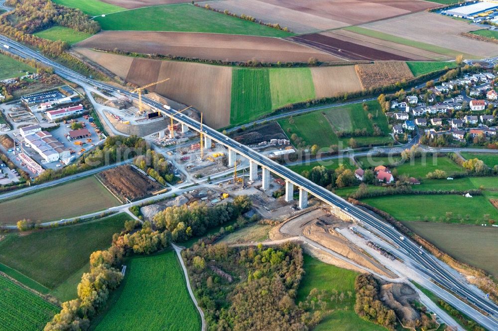 Kürnach from above - Construction site for the new building of Routing and traffic lanes over the highway bridge Kuernachtalbruecke in the motorway A 7 in Kuernach in the state Bavaria, Germany