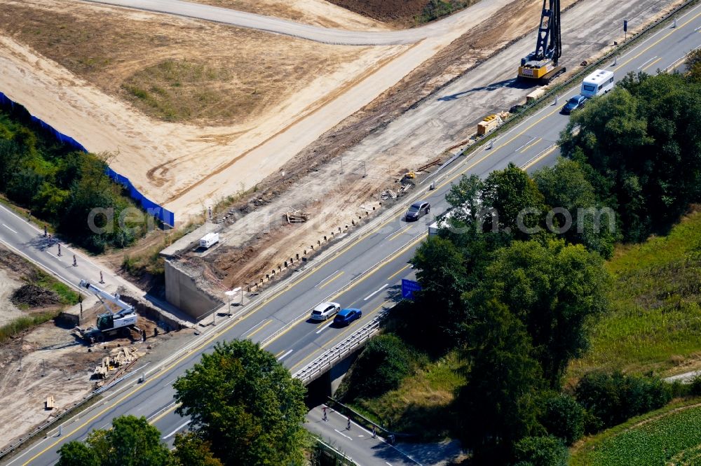 Aerial photograph Northeim - Construction site for the new building of Routing and traffic lanes over the highway bridge in the motorway A 7 in Northeim in the state Lower Saxony, Germany