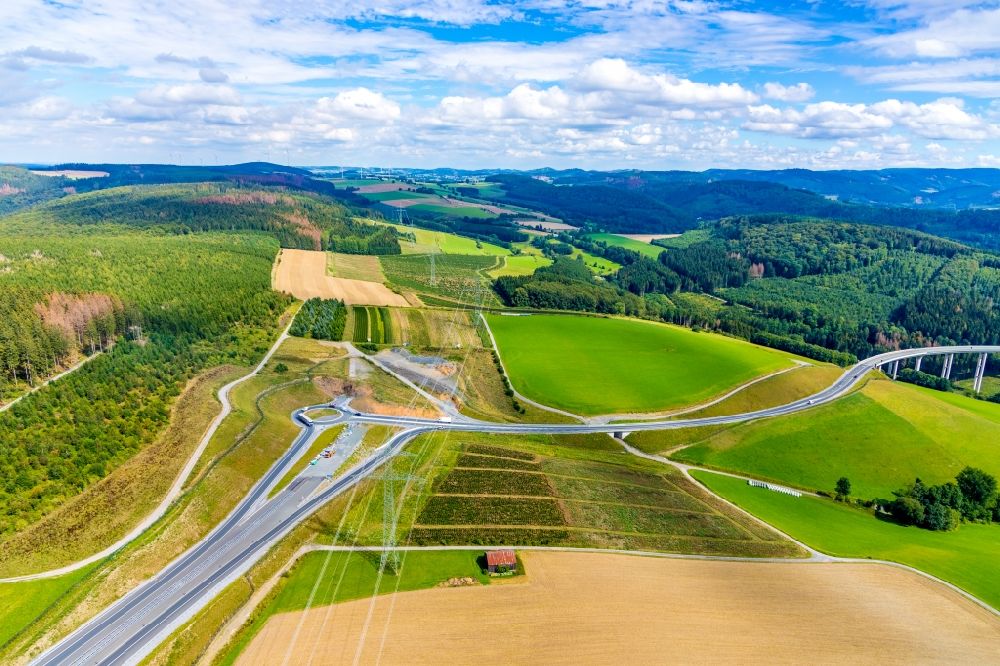 Aerial image Bestwig - Construction site of routing and traffic lanes during the highway exit and access the motorway A 46 with Kreisverkehr and Anschluss on Bandesstrasse B7 in the district Olsberg in Bestwig in the state North Rhine-Westphalia, Germany
