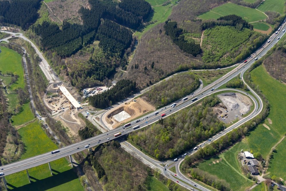 Olpe from the bird's eye view: Construction site of routing and traffic lanes during the highway exit and access the motorway A 45 to the B54 in Olpe in the state North Rhine-Westphalia, Germany