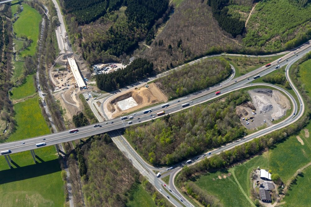 Aerial photograph Olpe - Construction site of routing and traffic lanes during the highway exit and access the motorway A 45 to the B54 in Olpe in the state North Rhine-Westphalia, Germany