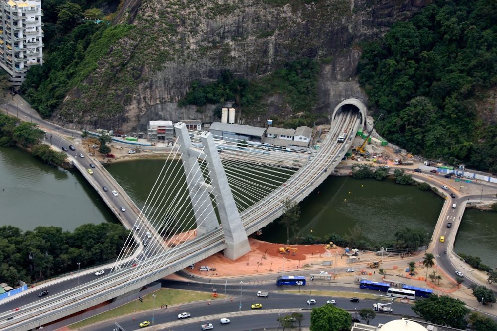 Rio de Janeiro from above - Construction of the Metro bridge and entrance to the tunnel, which leads through the Tijuca National Park, in the district of Barra in Rio de Janeiro in Brazil