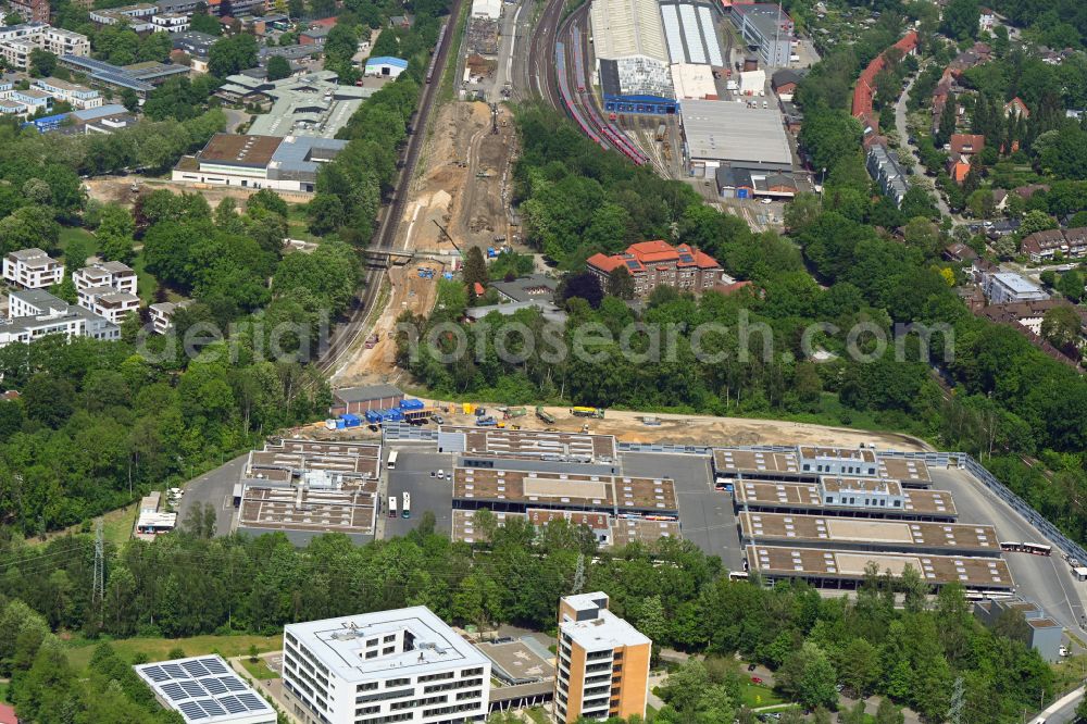 Hamburg from the bird's eye view: Construction site for the new construction of the local transport and bus depot and bus depot of the municipal transport company on street Tessenowweg in the district Alsterdorf in Hamburg, Germany