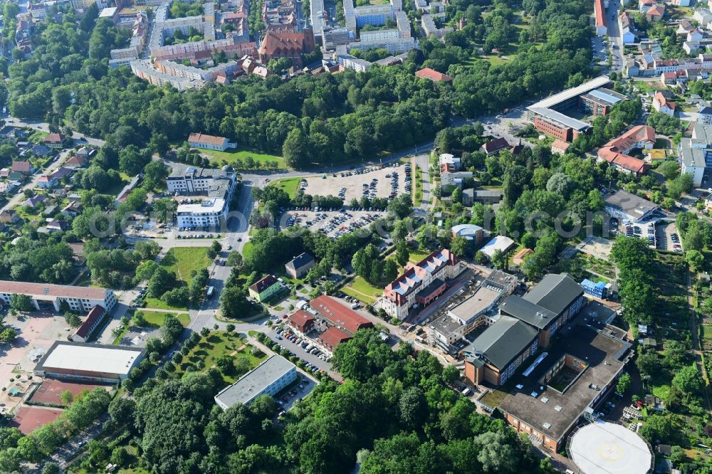 Bernau from the bird's eye view: Construction site for a new extension to the hospital grounds Herzzentrum Brandenburg Ladeburger Strasse in Bernau in the state Brandenburg