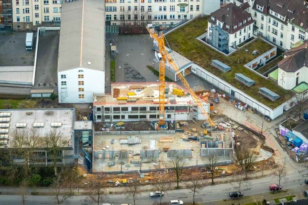 Bochum from above - Construction site for a new extension to the hospital grounds St. Josef-Hospital Bochum on Gudrunstrasse in Bochum in the state North Rhine-Westphalia, Germany