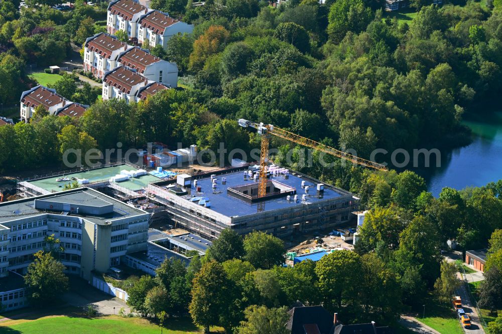Aerial image Lüneburg - Construction site for a new extension to the hospital grounds Psychiatrische Klinik Lueneburg on street Am Wienebuetteler Weg in the district Ochtmissen in Lueneburg in the state Lower Saxony, Germany