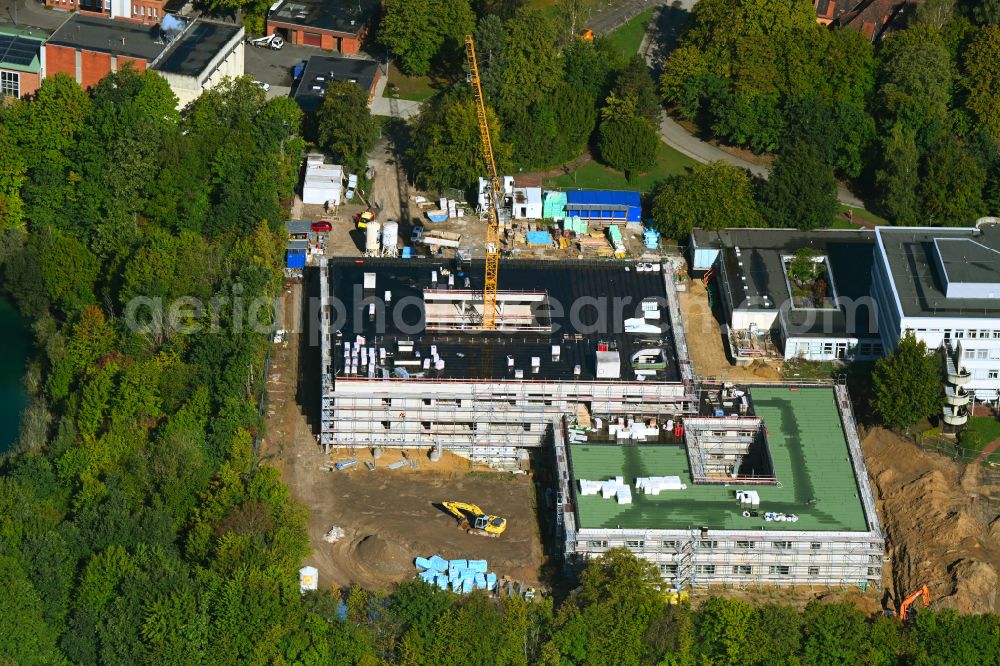 Lüneburg from above - Construction site for a new extension to the hospital grounds Psychiatrische Klinik Lueneburg on street Am Wienebuetteler Weg in the district Ochtmissen in Lueneburg in the state Lower Saxony, Germany