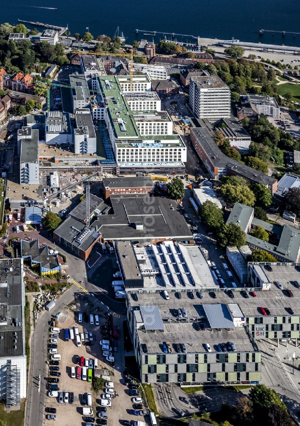Aerial photograph Kiel - Construction site for a new extension to the hospital grounds Universitaetsklinikum Schleswig-Holstein in the district Ravensberg in Kiel in the state Schleswig-Holstein, Germany