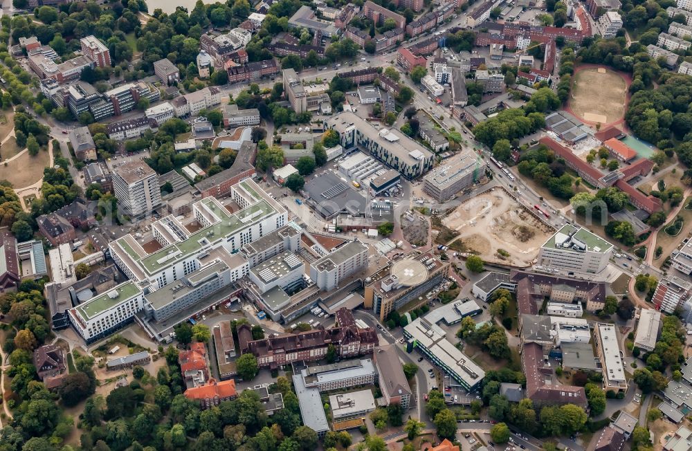 Aerial photograph Kiel - Construction site for a new extension building on the campus of the clinic grounds of the hospital University Hospital Schleswig-Holstein ( UKSH ) in the district Ravensberg on Feldstrasse in Kiel in the state Schleswig-Holstein, Germany