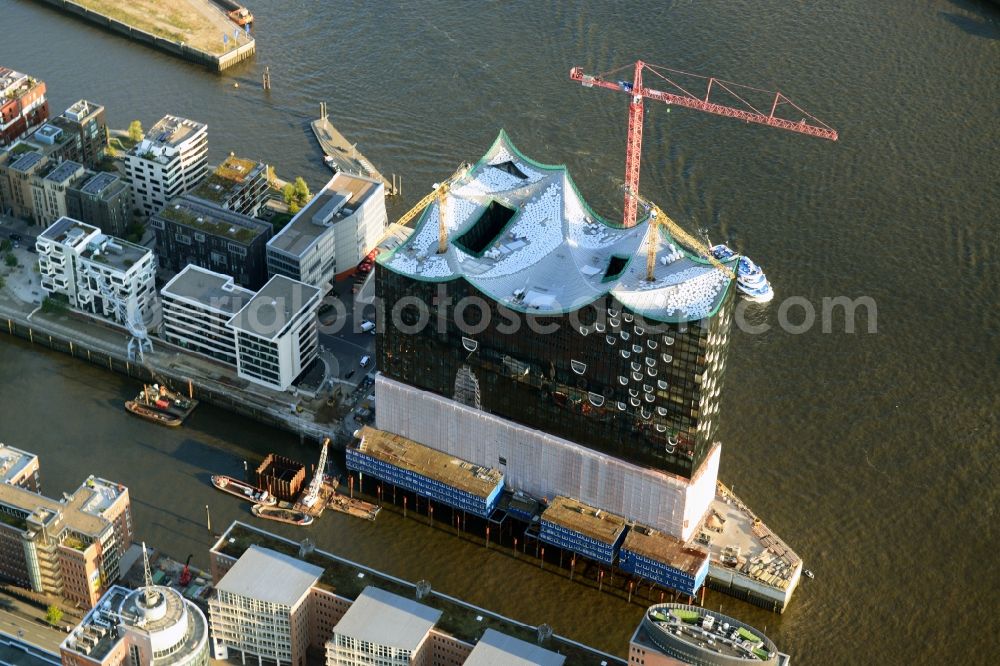 Hamburg from above - Construction site of the Elbe Philharmonic Hall on the banks of the Elbe in the warehouse district of Hamburg