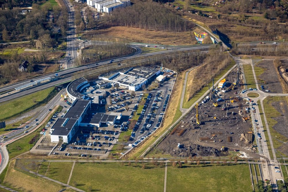 Aerial image Dortmund - Construction site in the development area of the Phoenix-West industrial wasteland between the buildings of the NORDWEST Handel AG and BMW Dortmund Niederlassung on Robert-Schuman-Strasse in the district Hoerde in Dortmund in the state North Rhine-Westphalia
