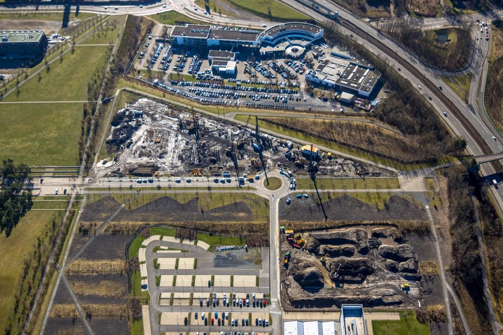 Aerial image Dortmund - Construction site in the development area of the Phoenix-West industrial wasteland between the buildings of the NORDWEST Handel AG and BMW Dortmund Niederlassung on Robert-Schuman-Strasse in the district Hoerde in Dortmund in the state North Rhine-Westphalia