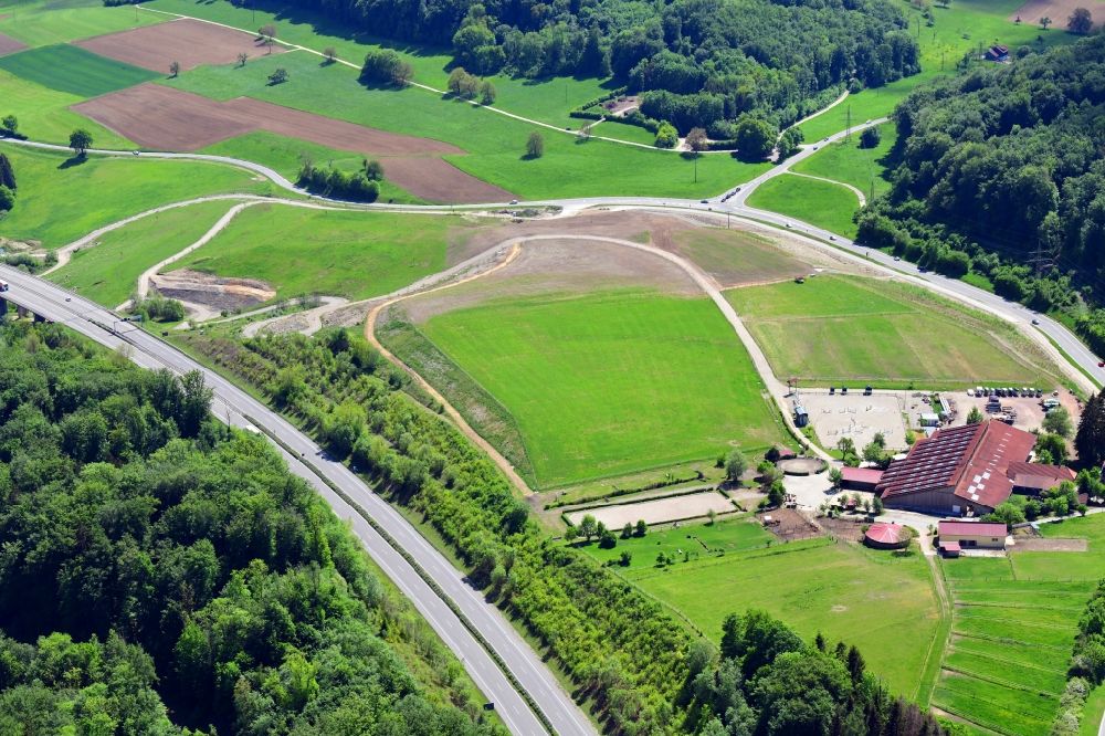 Aerial image Inzlingen - Construction site and earth dump from soil of the expansion of the motorway BAB A 98 in Inzlingen in the state Baden-Wurttemberg