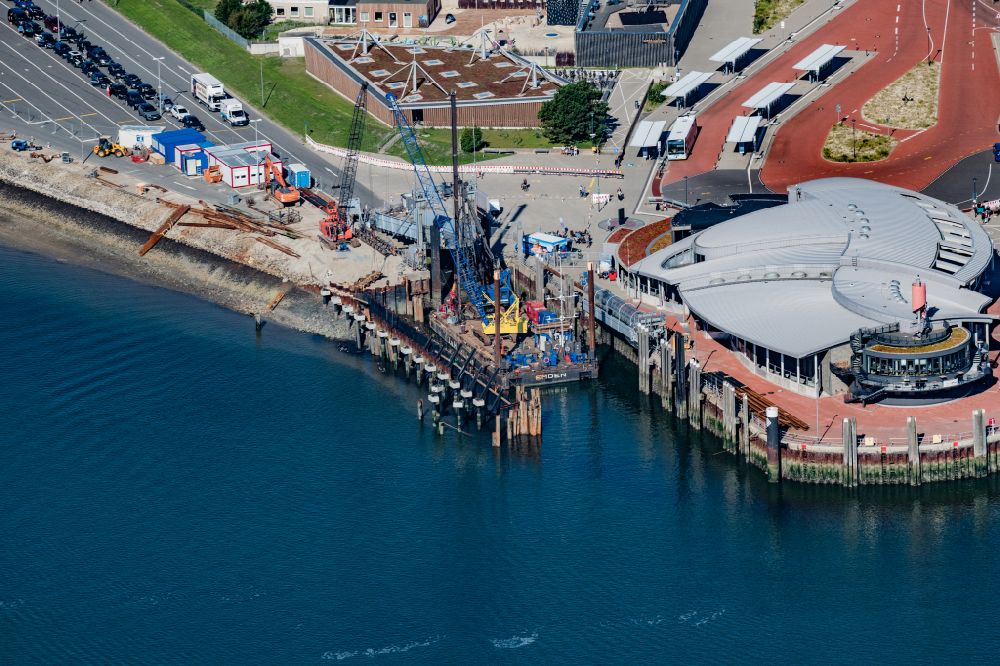 Norderney from above - Construction site for the renewal of the southern pier in the port of Norderney in the state of Lower Saxony, Germany