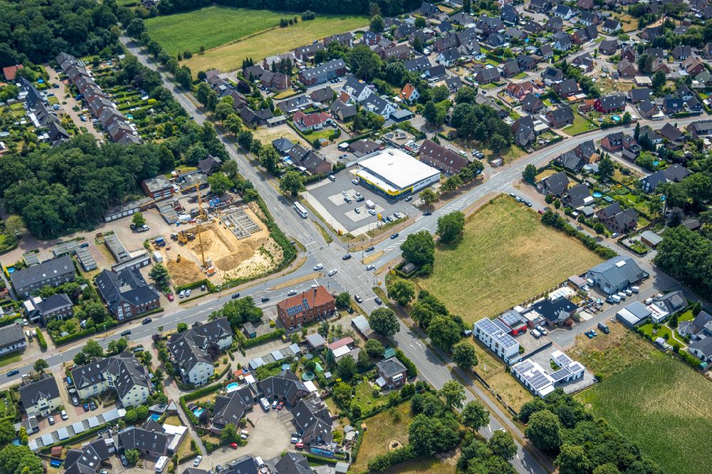 Hamminkeln from the bird's eye view: Construction site with development works and embankments works on Duisburger Strasse - Bahnhofstrasse and Storchenweg in the district Mehrhoog in Hamminkeln in the state North Rhine-Westphalia, Germany