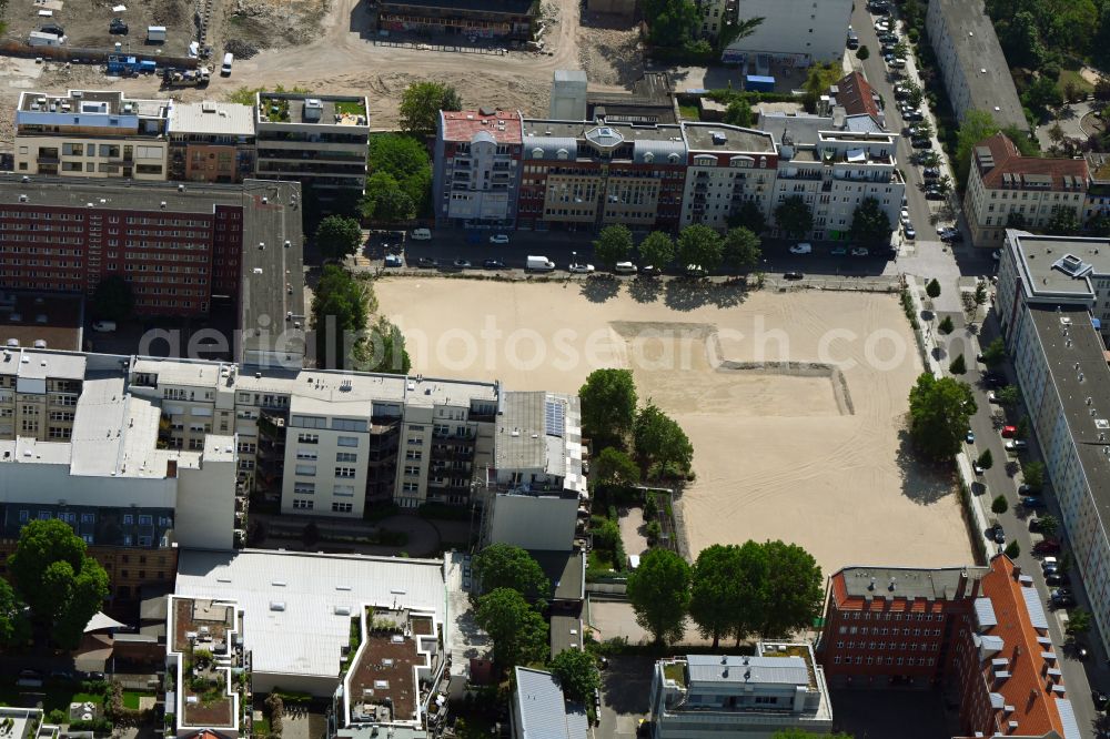 Aerial image Berlin - Construction site with development works and embankments works on corner Adalbertstrasse - Koepenicker Strasse in the district Mitte in Berlin, Germany