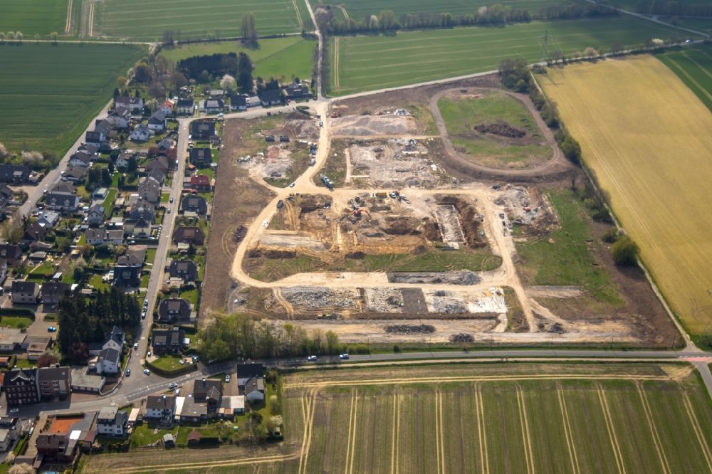 Aerial image Holzwickede - Construction site with development works and embankments works at the new residential park Emscherquelle on the site of the former Emscher barracks in Holzwickede in the state North Rhine-Westphalia, Germany