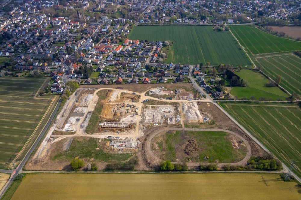 Aerial photograph Holzwickede - Construction site with development works and embankments works at the new residential park Emscherquelle on the site of the former Emscher barracks in Holzwickede in the state North Rhine-Westphalia, Germany