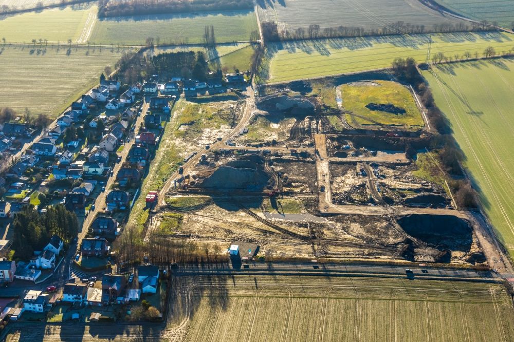 Aerial photograph Holzwickede - Construction site with development works and embankments works at the new residential park Emscherquelle on the site of the former Emscher barracks in Holzwickede in the state North Rhine-Westphalia, Germany