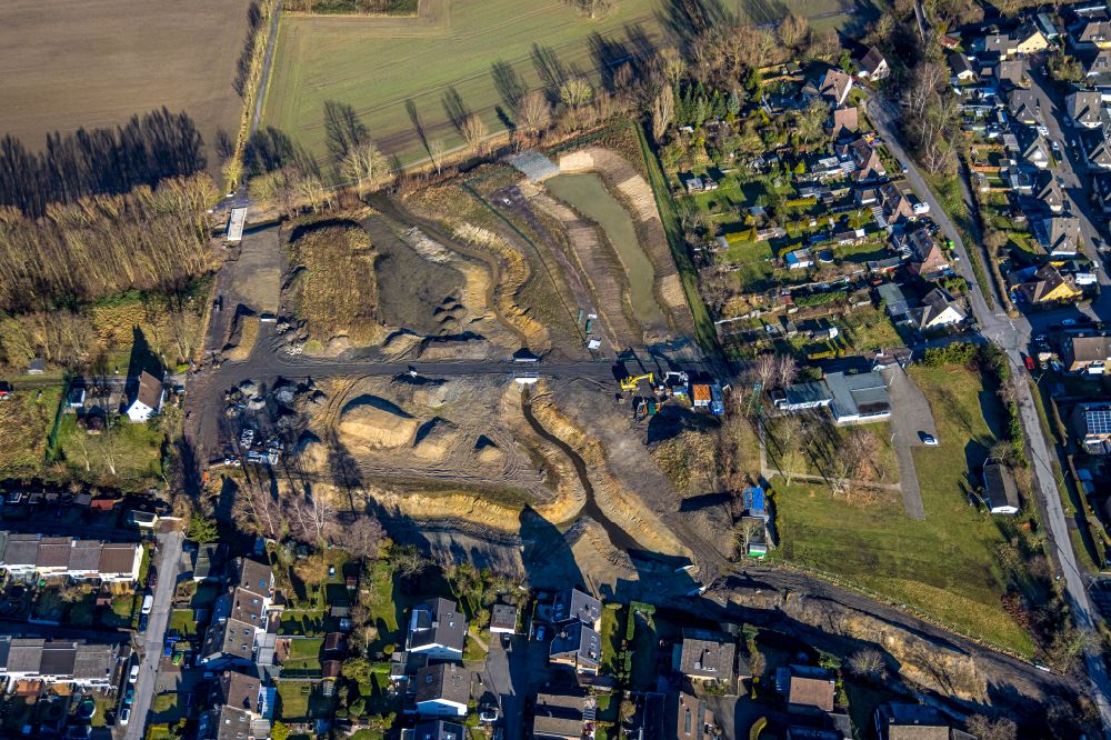 Hamm from the bird's eye view: construction site with development works and embankments works on street Mennenkamp in the district Norddinker in Hamm at Ruhrgebiet in the state North Rhine-Westphalia, Germany