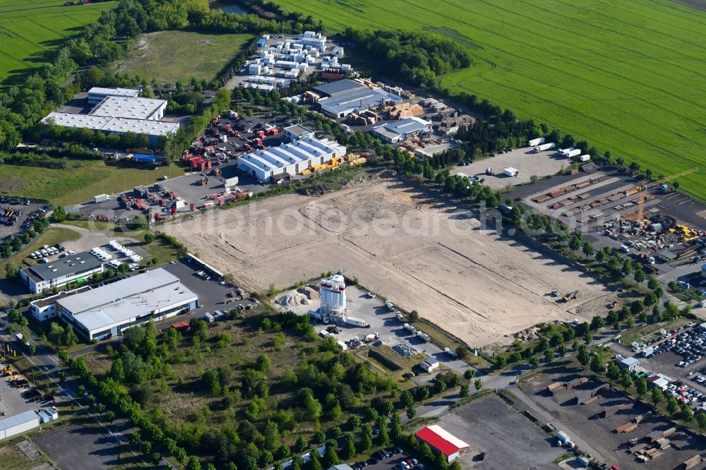 Aerial photograph Schenkendorf - Construction site with development works and embankments works in Industrie- and Gewerbepark Schenkendorf on Zeppelinring in Schenkendorf in the state Brandenburg, Germany
