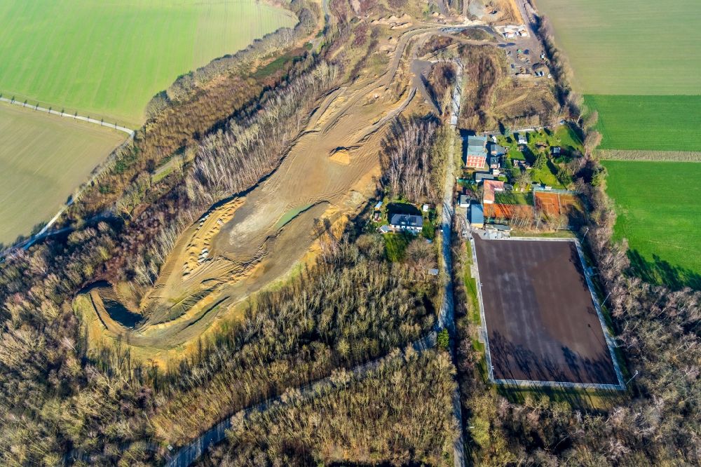 Bochum from the bird's eye view: Construction site with development, foundation, earth and landfill works for the new building of a golfpark and the renovation of a sports ground along the Noerenbergstrasse in Bochum in the state North Rhine-Westphalia, Germany