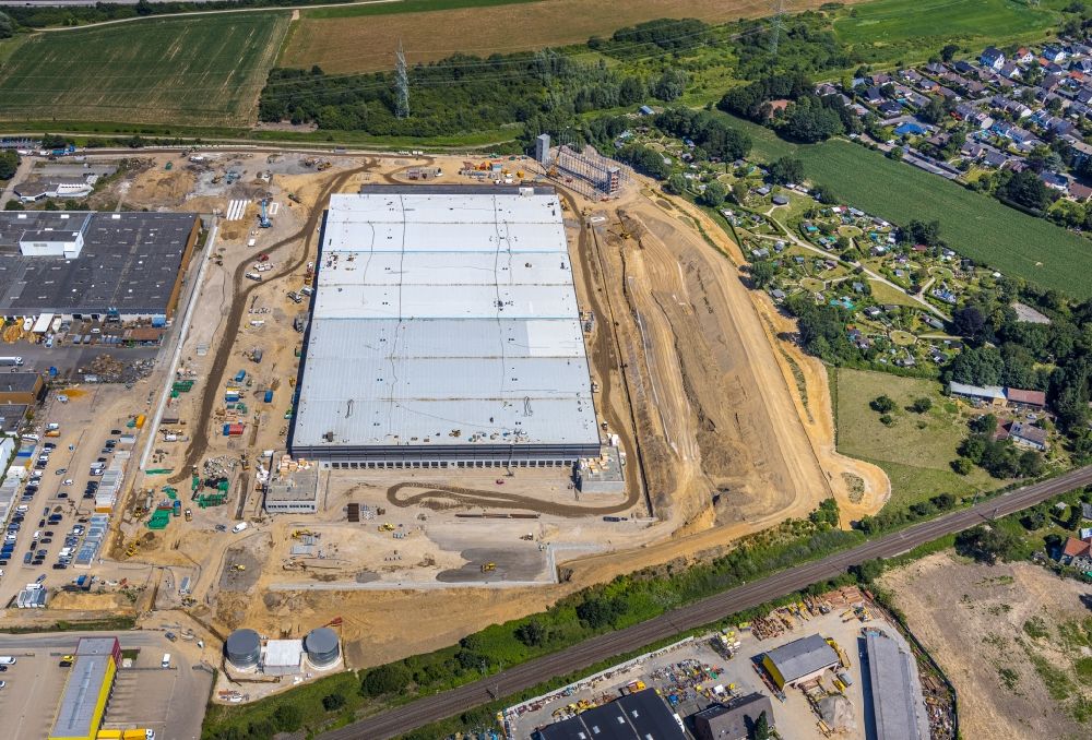 Aerial photograph Witten - Construction site with development, foundation, earth and landfill works to the new building of a logistic center on Menglinghauser Strasse - Siemensstrasse in the district Ruedinghausen in Witten in the state North Rhine-Westphalia, Germany