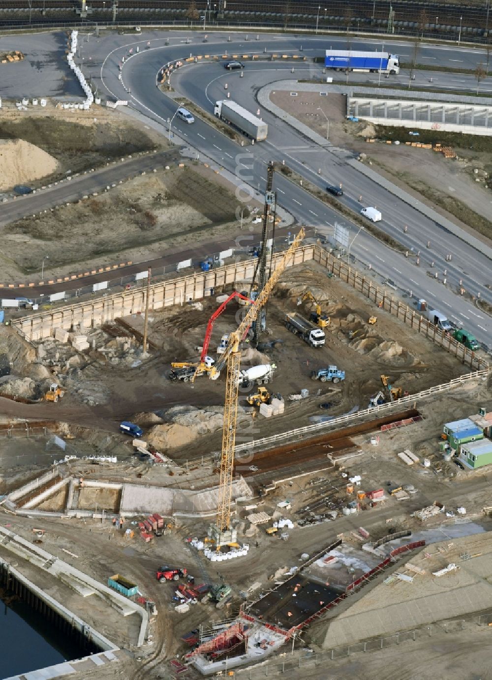 Hamburg from above - Construction site with piling works for the foundation slab of a new building on office ond commercial building in the district HafenCity in Hamburg, Germany